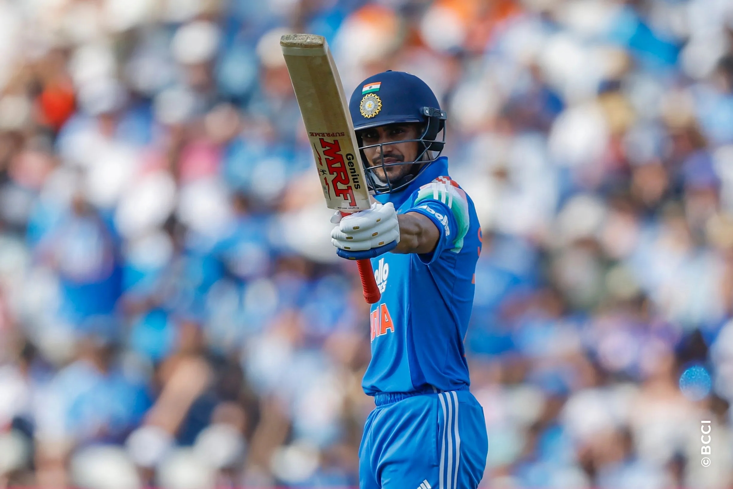 Shubman Gill (C) of India raises his bat after scoring a fifty during the 1st ODI match between England and India at the Edgbaston, Birmingham, England on July 14, 2026.Photo: Deepak Malik / CREIMAS for BCCI