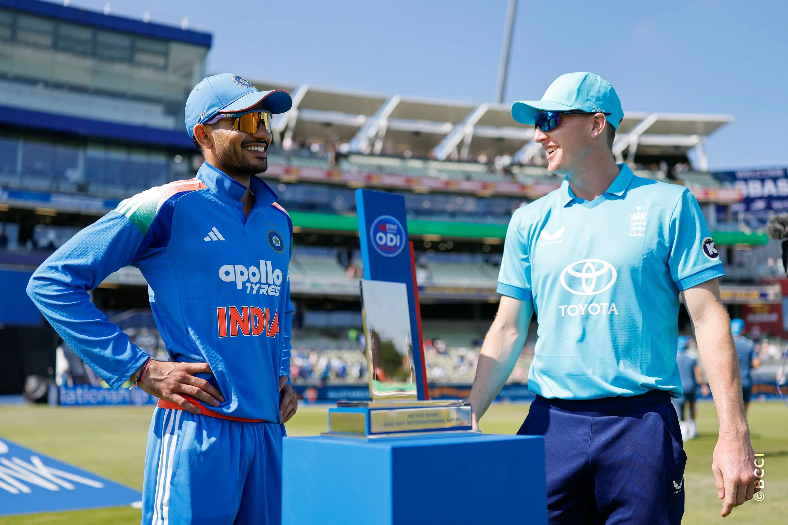 Shubman Gill (C) of India and Harry Brook with trophy during the 1st ODI match between England and India at the Edgbaston, Birmingham, England on July 14, 2026.Photo: Deepak Malik / CREIMAS for BCCI
