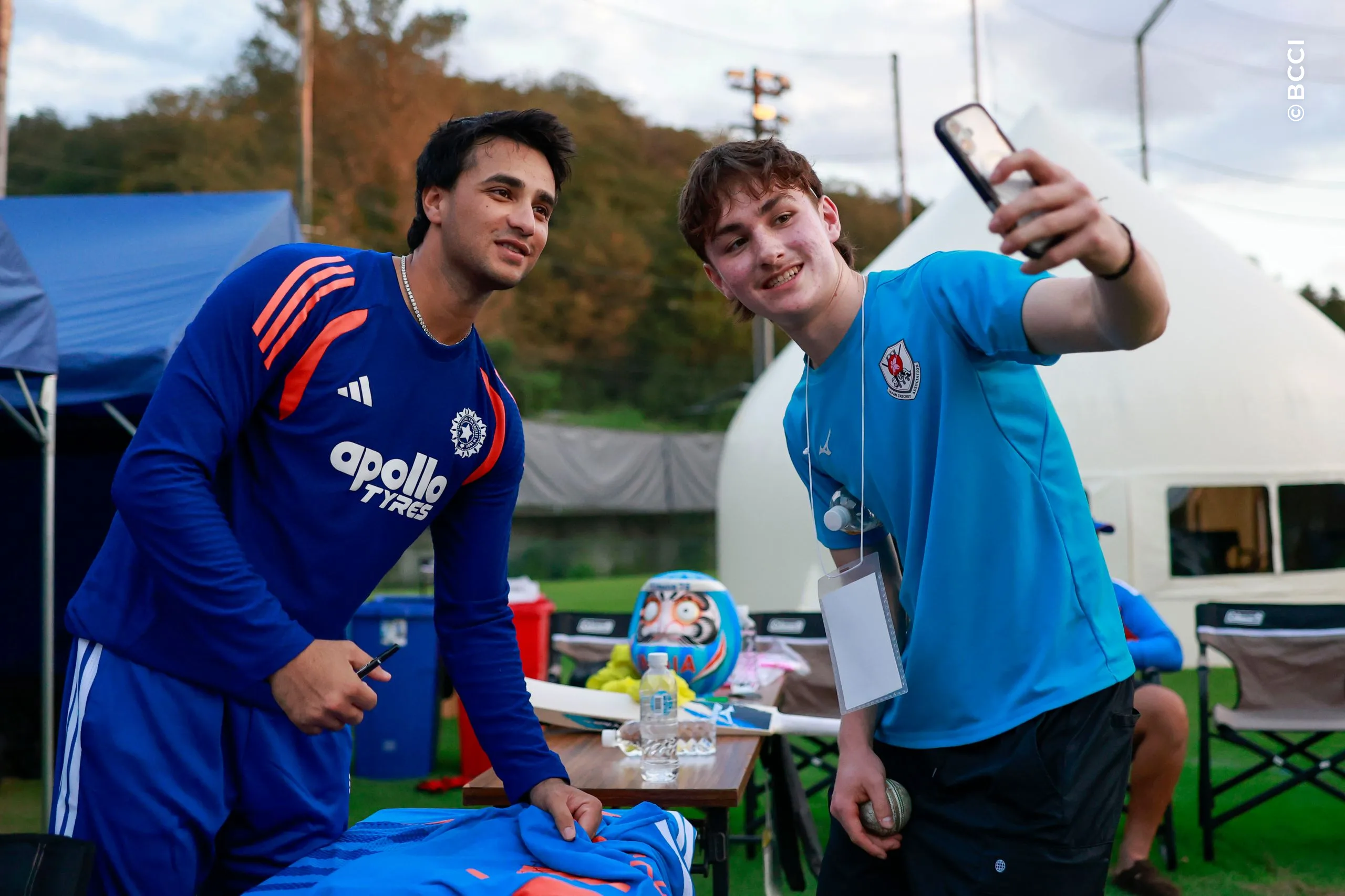 Kid with Abhishek Sharma of India during the Only T20I match between Japan and India at Sano Cricket Ground, Sano, Japan, on September 22, 2026.

Photo:  Deepak Malik / CREIMAS for BCCI