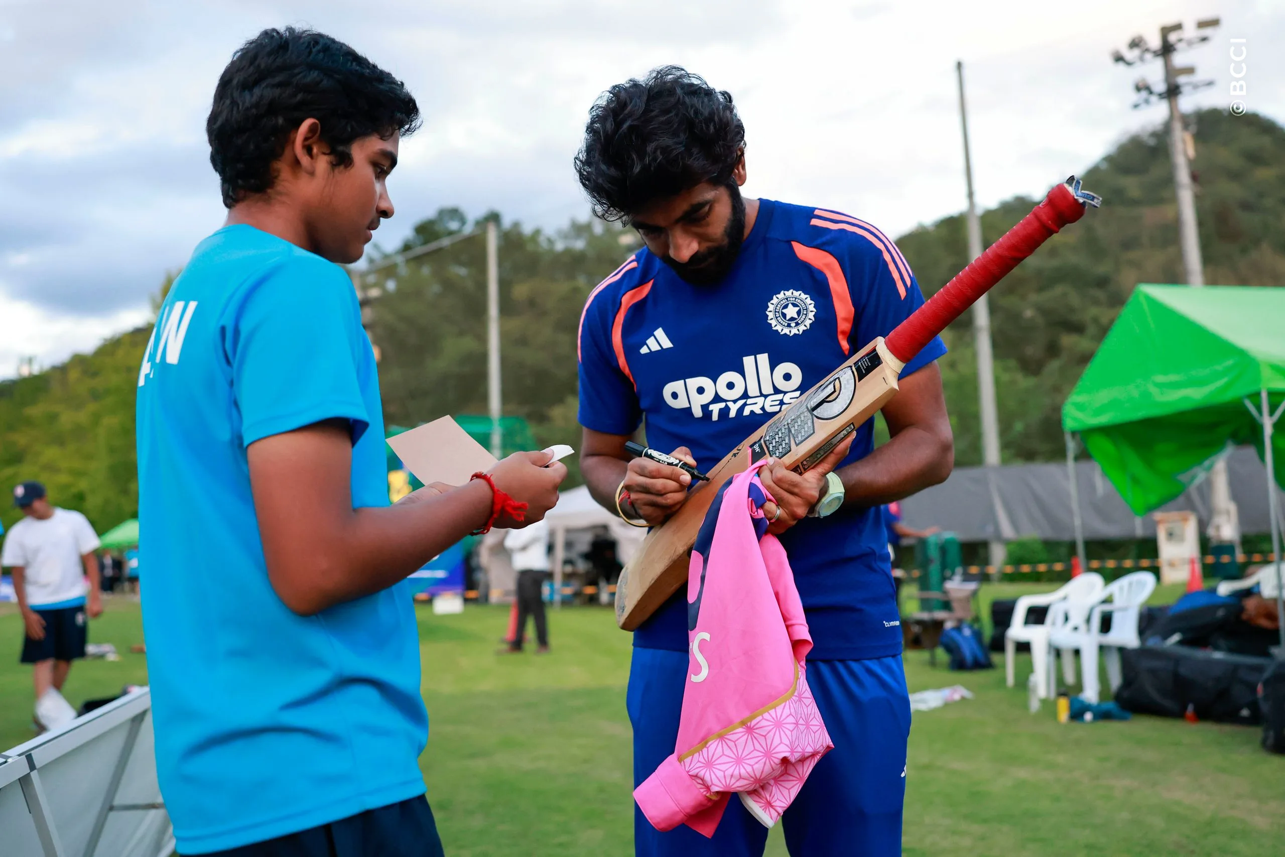 Jasprit Bumrah of India sign bat during the Only T20I match between Japan and India at Sano Cricket Ground, Sano, Japan, on September 22, 2026.

Photo:  Deepak Malik / CREIMAS for BCCI