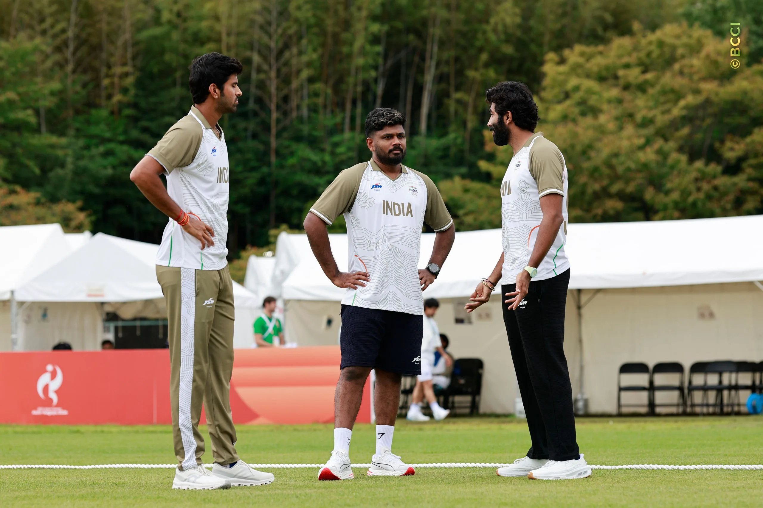 Washington Sundar, Sanju Samson and Jasprit Bumrah of India during the Quarter-Final match between the India and the Afghanistan at Korogi Sports Park, Nisshin, Japan, on September 28, 2026.

Photo:  Deepak Malik / CREIMAS for BCCI