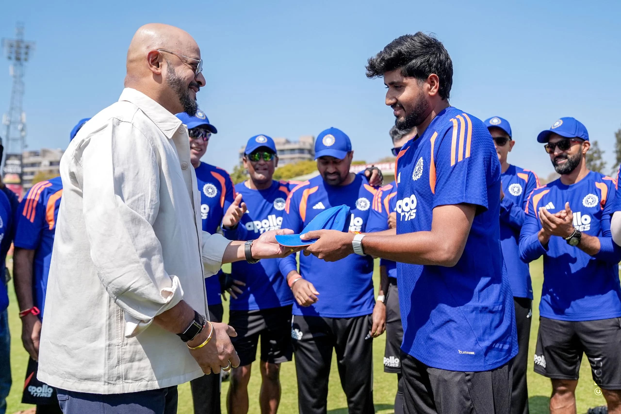 Yash Thakur of India receives his debutant cap from Murali Karthik Former Indian Cricketer during the 2ND T20 International match between Zimbabwe and India at the Harare Sports Club, Harare, Zimbabwe on July 25, 2026.Photo: Faheem Hussain / CREIMAS for BCCI