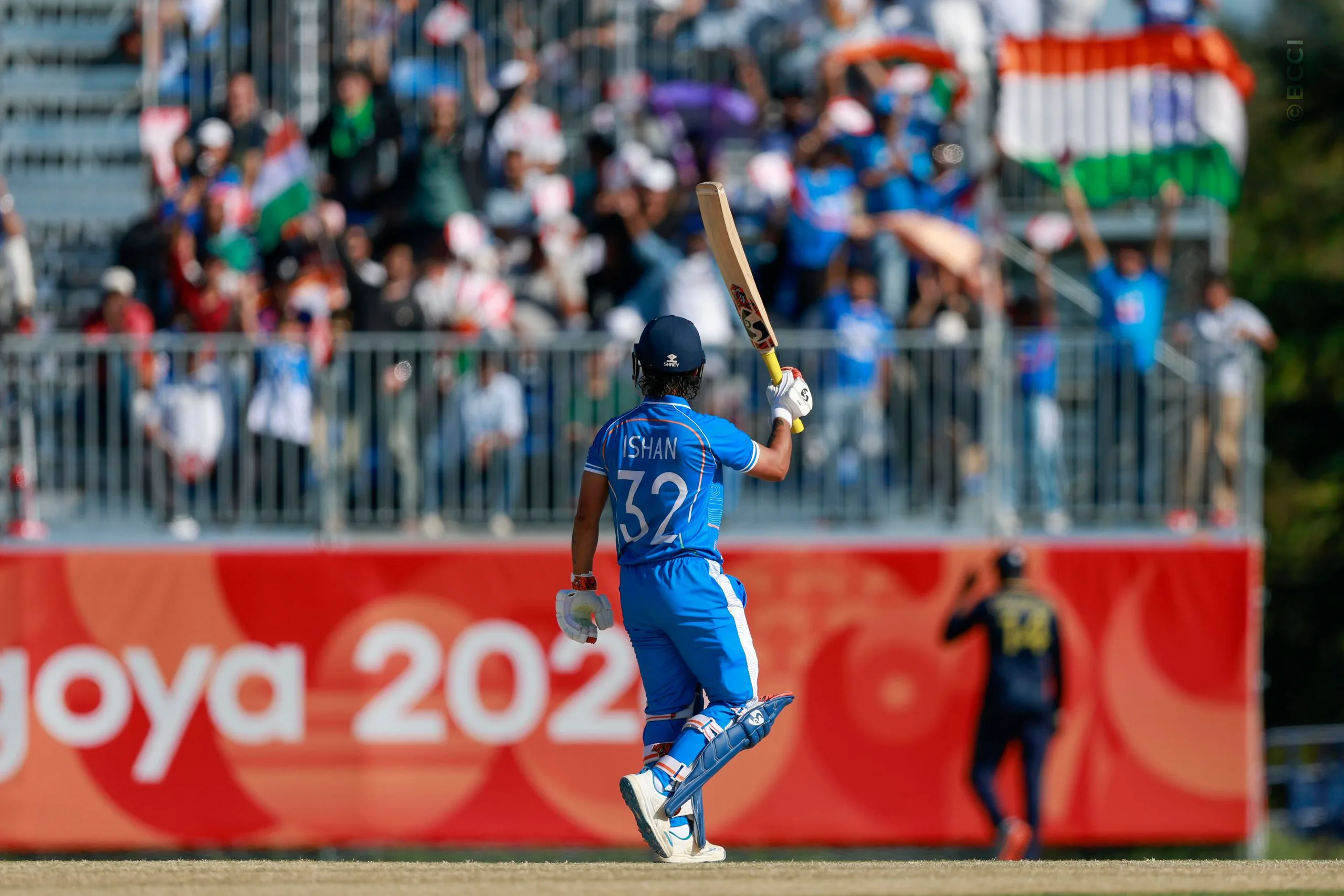 Ishan Kishan of India raises his bat after scoring a fifty during the Semi-Final match between the India and the Sri Lanka at Korogi Sports Park, Nisshin, Japan, on October 1, 2026.

Photo:  Deepak Malik / CREIMAS for BCCI